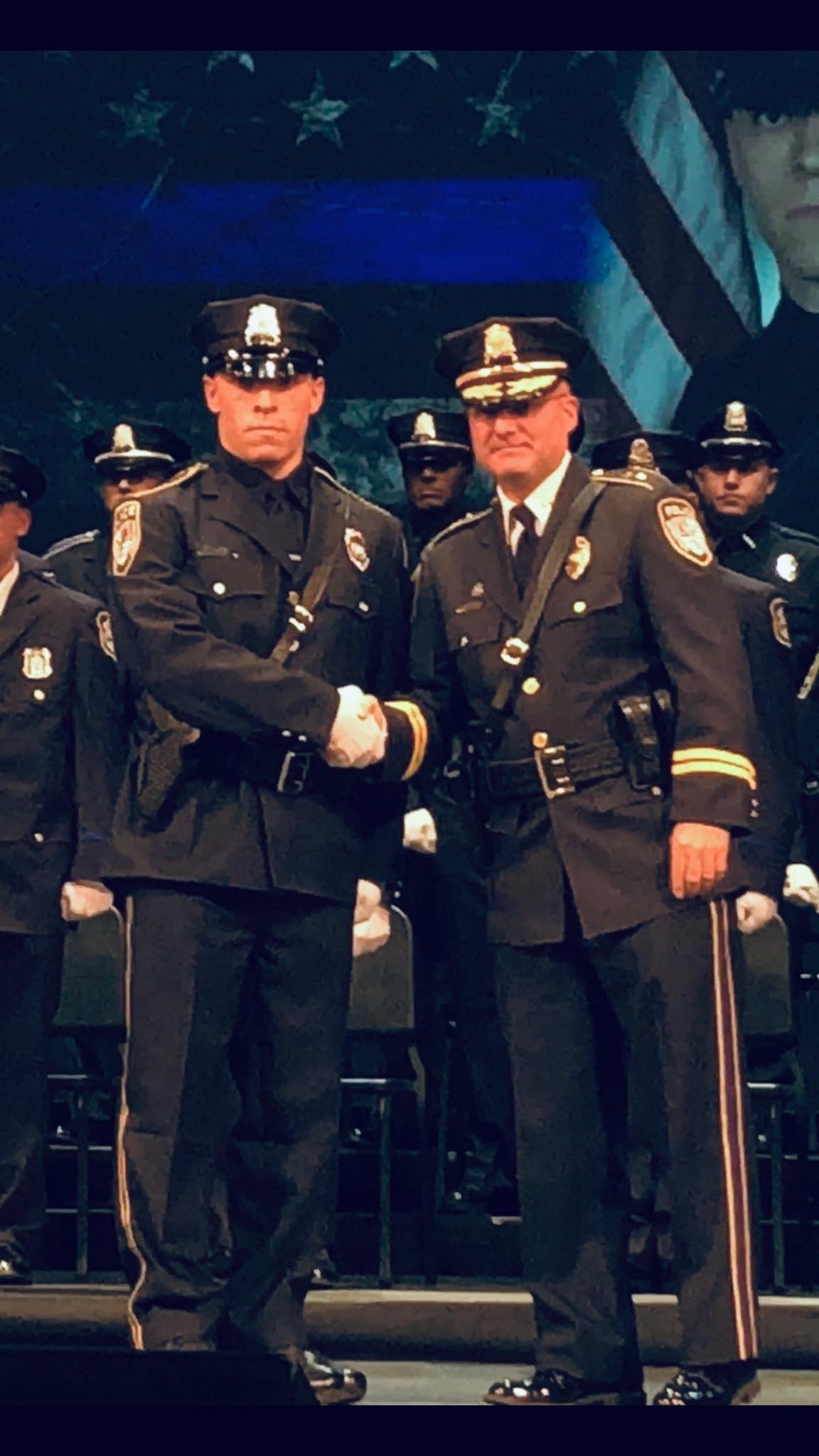 Chief Bernegger at Officer Keeney's graduation from the police academy.
